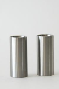 Stelton Salt and Pepper Shakers. Arne Jacobsen, Cylinda line. Danish Minimalist design. Brushed stainless steel. Mid century modern