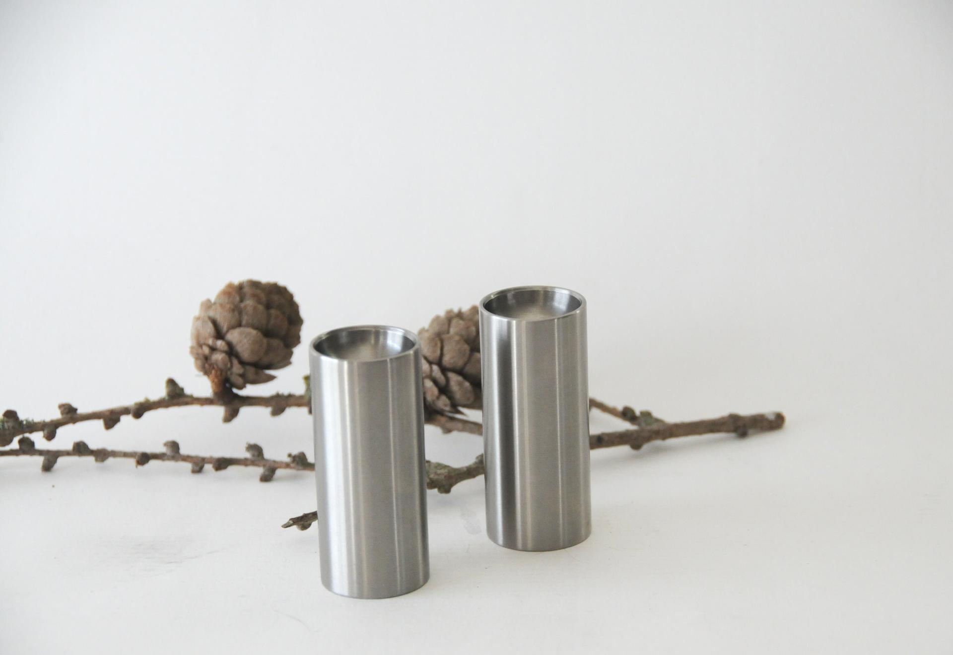 Stelton Salt and Pepper Shakers. Arne Jacobsen, Cylinda line. Danish Minimalist design. Brushed stainless steel. Mid century modern