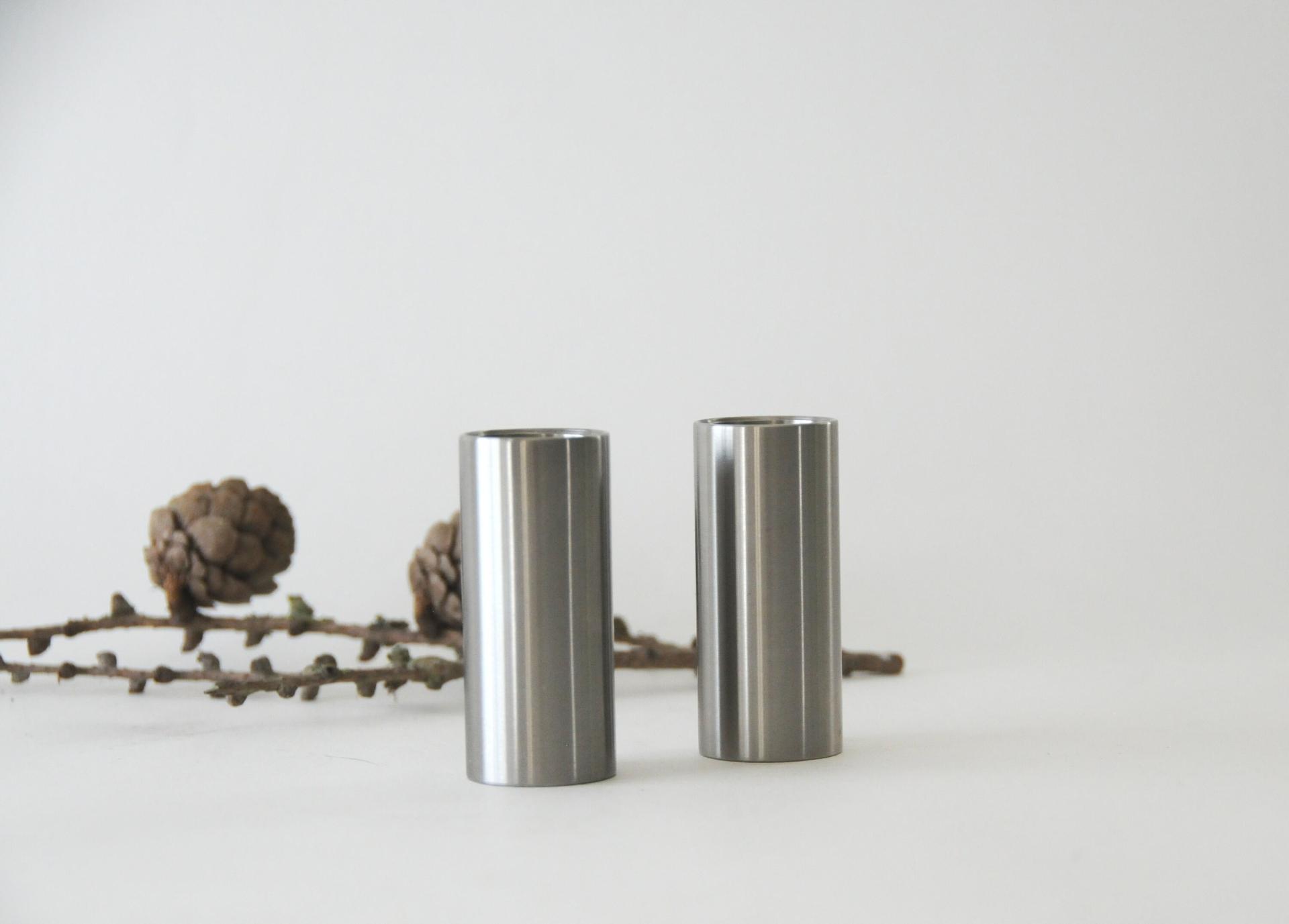 Stelton Salt and Pepper Shakers. Arne Jacobsen, Cylinda line. Danish Minimalist design. Brushed stainless steel. Mid century modern