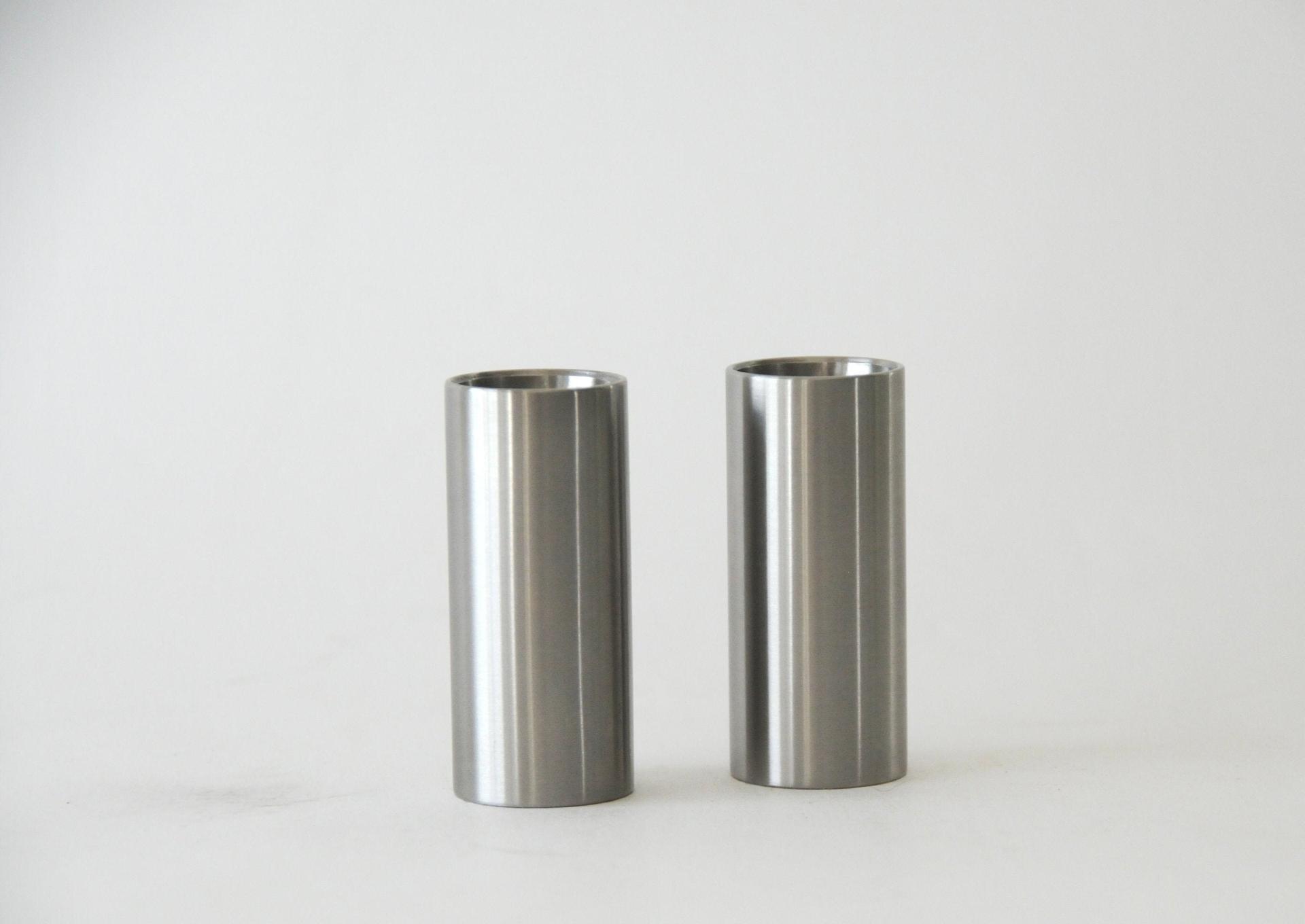 Stelton Salt and Pepper Shakers. Arne Jacobsen, Cylinda line. Danish Minimalist design. Brushed stainless steel. Mid century modern